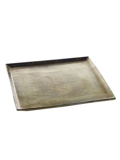 an empty metal tray on a white background