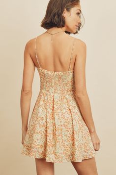 Another fun and flirty sundress to add to your summer wardrobe, our flare fitting Lily Floral cami mini dress is a sweet and soft style that's an absolute must for some outdoor summer fun. Complete with a square neckline, floral design, adjustable straps, smock detail on the back, and an A-line silhouette. Pair perfectly with strappy sandals. Model is 5'9" and wearing size Small. Square Neck Ditsy Floral Dress For Day Out, Summer Cotton Suspender Dress Mini Length, Summer Cotton Suspender Mini Dress, Summer Cotton Mini Suspender Dress, Cotton Suspender Dress For Spring Vacation, Cotton Suspender Dress, Mini Length For Spring, Spring Cotton Suspender Dress In Mini Length, Spring Cotton Mini Suspender Dress, Spring Mini Cotton Suspender Dress