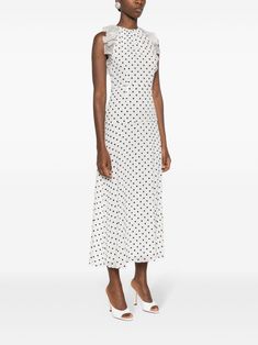 This Alessandra Rich maxi dress is crafted from silk georgette crepe with a polka-dot pattern and flocking detail. It features a round neck, sleeveless design, ruffled detailing, seam detailing, and a full lining. The dress has a long length, straight hem, and a concealed rear hook and zip fastening. Maxi Dress White, Polka Dot Maxi Dresses, Alessandra Rich, Versace Outfit, Yoko London, City Dress, Summer Beach Wear, Modern Bride, White Maxi Dresses