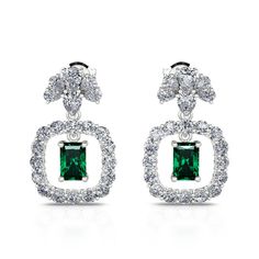 This classic earrings are timeless, bringing an opulent finish to casual and evening ensembles. Expertly crafted in sterling silver, each earring showcases a very fine radiant cut stone, surrounded by a single row of round brilliant white stones. A magnificent combination of radiant, teardrop and round cut stones all set in a gleaming silver design. Sweep hair into a low chignon to display the design in full.Carat Weight: 3 ctStone Size: 5*7 mmStone Type: Jeulia® StoneNumber of Stones: 2 Stone S Classic White Gold Baguette-cut Earrings, Formal Silver Radiant Cut Earrings, Formal Silver Diamond Earrings, Emerald Cut, Silver Emerald Cut Diamond Earrings For Formal Occasions, Formal Silver Emerald Cut Diamond Earrings, Elegant Gemstone Baguette-cut Earrings, Elegant Silver Radiant Cut Earrings, Elegant Emerald Earrings For Formal Occasions, Elegant Radiant Cut Silver Earrings