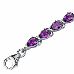 Inspired by a love of luxury Dress it up or dress it down. But don't leave the palace gardens without this crown jewel. This classic bracelet features pear shape Peora natural Amethyst gemstones in .925 sterling silver. Our natural Amethyst gemstones are a unique gift from nature. By cutting them in a way that respects the rough's natural radiance, we ignite their inherent intensity and maximize their brilliance to deliver on our signature Peora standard. Handcrafted in pure .925 sterling silver Palace Gardens, Blue Topaz Bracelet, Classic Bracelets, Round Stud Earrings, Amethyst Bracelet, Bracelet Sterling Silver, Silver Style, Royal Purple, Luxury Dress