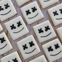 decorated cookies arranged in the shape of smiley faces