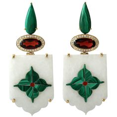 These intricate inlay earrings feature a unique hand painted floral malachite miniature art set with 18K gold & diamonds. It is set in 7.5-carats Garnet, 7.7 carats Malachite and .56-carats of diamonds. FOLLOW MEGHNA JEWELS storefront to view the latest collection & exclusive pieces. Meghna Jewels is proudly rated as a Top Seller on 1stDibs with 5 star customer reviews. All items manufactured by us are handmade and can be customized or redesigned. Size-68X29 MM Total Weight-26.12 Gold Weight(Gms Drop Earrings Simple, 1920s Jewelry, Malachite Earrings, Malachite Jewelry, Jeweled Earrings, Diamond Dangle Earrings, Gold Diamond Earrings, White Gold Earrings, Antique Earrings