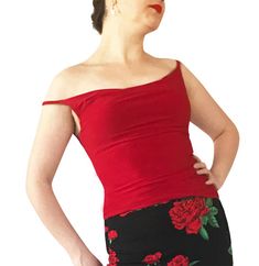 "Classic, all-around cami showcases your fabulous skirts and pants. Draped front and back necklines. Partially lined bodice. 5\" spaghetti straps work with most bras. Item #TL202. Soft, silky and stretchy poly/spandex jersey. Size: -Sizes 4 through 16 Fabric & Care: -Easy care, no-wrinkle poly/spandex -Hand wash cold. Hang dry. Overview: -Great for travel - rolls up small. -Handmade in our studio in Santa Fe, New Mexico USA. Questions about fabric, fit or size? Email me. I am delighted to he Chic Tops With Built-in Bra And Fitted Bodice, Fitted Camisole With Built-in Bra, Fitted Cami Tank Top With Built-in Bra, Fitted Camisole With Built-in Bra For Evening, Fitted Off-shoulder Top With Built-in Bra, Red Fitted Halter Top With Built-in Bra, Fitted Red Halter Top With Built-in Bra, Elastane Camisole With Built-in Bra For Night Out, Chic Fitted Strapless Camisole