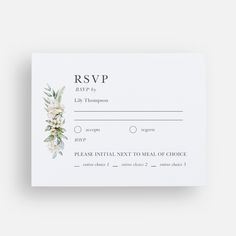 wedding rsvp card with white flowers and greenery