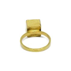 This 18k handmade gold ring is a truly unique piece of jewelry that is sure to capture attention and admiration. The ring is handmade with great care and attention to detail, using only the finest materials, 18k gold, and techniques to create a truly exceptional piece. A minimalist and an architect favorite ring. Mailed in a beautiful package suitable for gifting. At the center of the ring is a medium-sized cube made of concrete-cement (beton), a material that is known for its strength, durabili Luxury Gold Emerald Open Ring, Gold Rings With Gemstone In Recycled Gold, Gold Gemstone Rings In Recycled Gold, Unique Yellow Gold Open Moonstone Ring, Unique Yellow Gold Moonstone Open Ring, 14k Gold Moonstone Open Ring, Yellow Gold Brass Rings For Anniversary, Gold Rings With Gemstone In Brass, Handmade Gold Diamond Ring Elegant Style