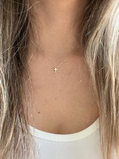 Ensure lasting memories for the special moments in your life with this 14K gold tiny cross necklace, a religious jewelry gift. Crafted for women of Christian faith, this small cross pendant is bold and designed in a 3D mini cross configuration. Free shipping offered. This piece is beautiful, elegant, shiny, and suitably sturdy for a baptismal gift. ⁙ Materials: 14K Yellow Gold⁙ Dimensions: 8MM Height by 6MM Width in diameter, the chain is very sturdy and 1MM wide, it is 16"-18" it can be hooked Real Gold Cross Necklace, Mini Cross Necklace, Small Gold Cross Pendant, Small Gold Cross Necklace, Christian Cross Jewelry, Tiny Gold Cross Necklace, Small Chains Gold With Pendant, Little Cross Necklace, Small Cross Necklace