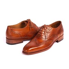 Paul Parkman Luxury Handmade Shoes Men's Mid Brown Calf-skin Leather Wingtip Oxfords 5447-BRW (PM5921) Material:Calf-skin Leather Color:Brown Hardware:None Outer Sole:Natural leather sole Wingtip oxford style brogues Camel colour leather lining and inner sole Comes with Original box and dustbag. PAUL PARKMAN creations are all made strictly by hand in a small factory in limited numbers. They feature obsessive research into leathers materials and details. Entirely handmade and hand painted. Made t Oxford Style, Brown Oxfords, Wingtip Oxford, Modern Gentleman, Painting Leather, Shoe Size Conversion, Handmade Shoes, Natural Leather, Fashion Sunglasses