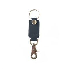 The Rein Clip offers quick access to your keys whether you want to unclip them or just unsnap the loop around your keyring. This is the perfect key fob to attach to your gym bag, purse, or belt loop. The Rein Clip is made with the same 5-6 oz. leather we use for our wallets, and the sturdy nickel hardware will keep your keys secure. Dimensions: 6 1/2" X 1 3/8" Modern Keychain With Key Clip, Black Keychain With Key Leash For Personal Use, Black Keychains With Interior Key Chain Holder, Black Keychain With Key Clip For Everyday Use, Free Monogram, Nickel Hardware, The Loop, Leather Keychain, Key Fob