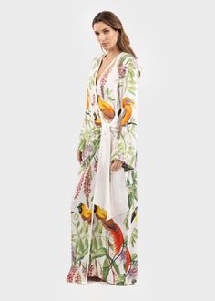 Spring Pre-draped V-neck Maxi Dress, Spring Silk Wrap Dress, Maxi Length, Elegant Wrap Dress With Kimono Sleeves For Beach, Elegant Draped Maxi Dress For Vacation, Elegant Wrap Dress For Vacation, Spring Faux Wrap Maxi Dress, Silk V-neck Maxi Dress With Tie Waist, Summer Silk Wrap Dress, Silk Wrap Maxi Dress For Spring