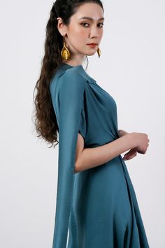 If you are looking for an elegant, elegant but equally luxurious and noble design, this will be an item you cannot ignore. *Note:Processing time takes 5-8 working days (NOT including shipping time). Product Details - Product type: Midi Dress- Material: Silk- V-neck - Long flap - Short sleeves - Asymmetric draped skirt - Back zipper- Length: 104-106cm Size & Fit - Model wears size: M- Model measurement: 172cm Care Instruction - Hand-washed products.- Do not soak the product.- Do not use chlorine Evening Blue Maxi Dress With Draped Sleeves, Blue Maxi Dress With Draped Sleeves For Evening, Elegant Blue Maxi Dress With Cape Sleeves, Blue Maxi Dress With Draped Sleeves For Party, Blue Evening Dress With Draped Sleeves For Formal Events, Blue Midi Dress With Draped Sleeves For Evening, Blue Maxi Dress With Cape Sleeves For Evening, Pre-draped Asymmetrical Midi Dress For Dinner, Blue V-neck Silk Dress For Formal Occasions