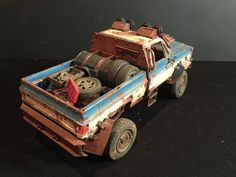 the toy truck is made out of wood and plastic