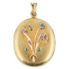 This rare Russian 14k yellow gold locket from St. Petersburg, circa 1900 was created during the Romanov era of Tsar Nicholas II. The front of the oval yellow gold locket applied with a rose gold bouquet set with rose diamonds and turquoise cabochons, opening to reveal two vacant compartments. 1 9/16 in. ( 4 cm.) long including suspension ring; locket alone measures 1 3/16 x 1 x 1/4 in. (3 x 2.5 x .6 cm.) (l x w x h). Chain and pin not included. Russian gold rope chain illustrated is 25 inches lo Victorian Yellow Gold Locket Necklace With Filigree, Victorian Filigree Locket Necklace In Yellow Gold, Victorian Filigree Yellow Gold Locket Necklace, Victorian Yellow Gold Medallion Locket Necklace, Victorian Yellow Gold Locket Necklace, Victorian Style Yellow Gold Locket Necklace, Victorian Yellow Gold Locket Necklace For Anniversary, Antique Yellow Gold Locket Necklace, Antique Yellow Gold Locket Necklace For Wedding