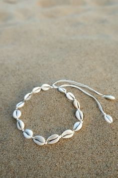 What started off as an Instagram trend last summer, is now a full blown shell-mania and we totally get it - after all, nothing says summer like shells do. Make your neck, wrist and ankle look chicer than ever with our cowry jewellery. Ethically handmade in Bali, can be worn with absolutely anything. The trend transcends seasons and shell chokers are now paired with thick winter sweaters, while cowry anklets look great with fall booties. Our jewellery is 100% waterproof and washable so you can en Adjustable Shell Choker For Vacation, Summer Shell Choker, Summer Vacation Shell Choker, Handmade Shell-shaped Choker, Handmade Shell-shaped Beach Choker, Cowrie Shell Necklace, Cowry Shell, Shell Choker, Instagram Trends