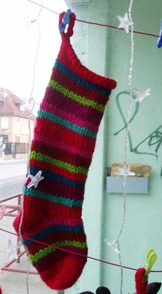 christmas stockings hanging on a clothes line