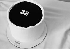 a black and white photo of a hat with the number 22 on it