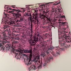 Who Loves Short Shorts?! Pink & Blue Denim Acid Wash Cut Off Shorts. High Waisted, Distressed And Lots Of Stretch. Features Faux Front Pockets With Useable Back Pockets. Pink Bottoms With Frayed Hem For Summer, Pink Frayed Hem Shorts For Summer, Pink Cutoff Bottoms For Summer, Pink Shorts With Frayed Hem For Spring, High Waist Pink Jean Shorts For Summer, High-waisted Pink Jean Shorts For Summer, Pink Frayed Hem Shorts For Spring, Pink Jeans With Frayed Hem For Summer, Trendy Pink High-waisted Jean Shorts