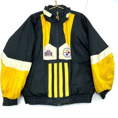 "Vintage Pittsburg Steelers Reversible Puffer Jacket Size XL Black Nfl Size / Measurements (Based in inches) Size: XL (As per measurements, missing size tag) Pit to pit - 29 \" Length - 27.5 \" Shoulder Sleeve to Cuff - 25 \" Condition / Details Stains on both sleeves and front on front reverse side Minor distressing around neckline on front reverse side Missing hood Combined Shipping: We provide combined shipping, please contact us for a quote" Reversible Puffer Jacket, Pittsburg Steelers, Fleece Sweater, Womens Fleece, 1/4 Zip, Puffer Jacket, Shoulder Sleeve, Sweater Jacket, Mens Jackets