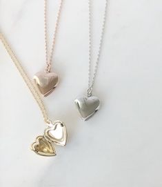 "Heart locket necklace, Locket necklace, gifts for her, birthday gift, dainty locket, heart necklace, rose gold necklace, gold locket, silver locket Delicate and mini heart shaped locket suspended on dainty 18\" cable chain *Heart locket pendant is approx 13mm, inside size is approx 9mm *Available in 3 finishes: Rose Gold Gold Rhodium SHIPPING: *Free domestic shipping on all orders PACKAGING: *All pieces come beautifully packaged, perfect for gift giving. Find more to ❤️ here: http://etsy.com/sh Rose Gold Locket Necklace With Charms For Gift, Dainty Rose Gold Pendant Locket Necklace, Dainty Heart Pendant Locket Necklace With Charm, Dainty Heart Pendant Charm Necklace For Best Friend, Heart Shaped Dainty Locket Necklace With Delicate Chain, Gold Locket Necklace For Valentine's Day Best Friend Gift, Dainty Heart Locket Necklace With Charm, Dainty Heart Locket Necklace With Delicate Chain, Elegant Heart Pendant Jewelry For Best Friend