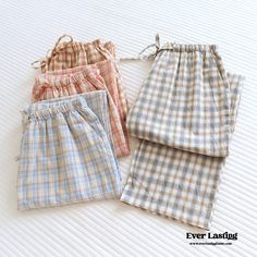 Lounge in comfort with Ever Lasting's Plaid Washed Cotton Pajama Pants. Made from super soft and breathable washed cotton, these pants bring ultimate comfort and style to your relaxation routine. The classic plaid pattern adds a timeless touch, making them perfect for lounging at home or enjoying a cozy night in. With an elastic waistband and relaxed fit, these pajama pants are designed for maximum comfort after a long day. Treat yourself to the perfect blend of comfort and style with our Plaid Washed Cotton Pajama Pants. Features: Relax Fit Premium Quality Stretchy Waistband Breathable (great for all seasons) 100% Cotton Great Gift! Sizes: Small/Medium: Pant Length 38 in (96cm), Waist 42 in (106cm), Hip 25 in (63cm) Medium/Large: Pant Length 39 in (99cm), Waist 44 in (112cm), Hip 26 in (6 Pyjamas Pants, Stylish Pajamas, Christmas Pajama Pants, Cotton Pajama Pants, Pajama Pattern, Cozy Pants, Plaid Pajama Pants, Cute Pajama Sets, Cozy Pajamas