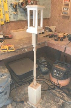 a workbench with tools and equipment on it