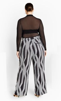 Turn heads in the gorgeous print stylings of our Lalia Print Pant. Complete with a wide leg cut and high waist, these pants are as chic as they are on-trend. Key Features Include: - Flat belt looped waistband - Front pleat detail - Double hook & eye fastening - Functional side pockets - Relaxed culotte leg - Full length - Unlined - Soft touch, slight stretch fabrication Style with a buttoned blouse and statement earrings to complete your outfit. | Plus Size Laila Print Pant in Black Mono, Size 2 Plus Size Clothing Online, Print Pant, Printed Pants, City Chic, Hook Eye, The Chic, Black Pants, Statement Earrings, Plus Size Outfits