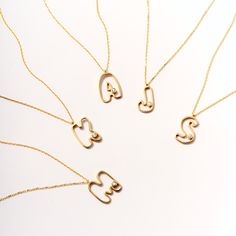 Elevate your style with our Diamond Cut-Out Initial Necklace for Women. Crafted from 14k Solid Gold, this unique cut-out initial pendant is personalized with exquisite diamonds, making it a perfect gift. Its unparalleled design and luxurious appeal enhance any outfit, making it a must-have accessory for every fashion-forward woman. This personalized diamond necklace not only adds a touch of sophistication to your look but also serves as a unique gift, perfect for any special occasion. 14K solid Bubble Letter Necklace, Bubble Letter, Diamond Initial Necklace, Solitaire Necklaces, Cross Bracelet, Outfit Making, Personalized Bracelets, Evil Eye Necklace, Evil Eye Bracelet