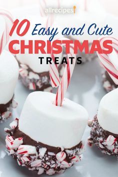 christmas treats on a plate with candy canes and marshmallows in the middle