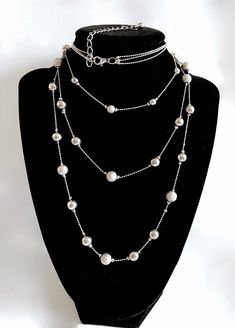 Lovely vintage, silver toned ball chain multi-strand necklace with both smooth and textured balls. The shortest strand is about 21" long and the longest is 28" with a lobster claw clasp and an extension chain of 3" with a silver ball at it's end. This piece looks like you have stacked three identical chains...very pretty look!  Great costume jewelry necklace in pristine vintage condition with free First Class Domestic shipping! US sellers are not authorized to collect VAT/customs fees for other Photographing Jewelry, Ball Chain Necklace, Costume Jewelry Necklaces, Multi Strand Necklace, Gorgeous Necklaces, Strand Necklace, Ball Chain, Jewelry Necklace, Multi Strand