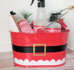 a santa claus bucket filled with cleaning products