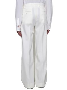 Dolce & Gabbana's natural white stretch virgin wool trousers featuring belt loops, button and zip fly, side pockets, rear buttoned welt pockets and straight leg with ironed crease.Size Type: Italy ManGender: MenMaterial: WOOL OR FINE ANIMAL HAIR->VIRGIN WOOL98 % SYNTHETIC->ELASTANE2 %Color: BIANCO NATURALEMade in: ITProduct ID: GYZMHTFUBGGW0001*Import tax/duty will be calculated at checkout (If applicable) Wool Trousers, Pet Hair, Welt Pocket, Dolce And Gabbana, Straight Leg, Trousers, Italy, Wool, Hair