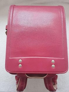 Randoseru : This randoseru made by Mitsukoshi Bag company Which is one of the best randoseru maker in Japan. Its made by high quality Cowhide.  Item: Cowhide Leather school Bag / Japanese Randoseru No. rnd022 Color: Pink Condition: Used/ Very Good. Please check the listing pictures. Size: Adult Wearable You could put your laptop without any ploblem. Mitsukoshi Bag Company / Made in Japan Tsuchiya bag is one of the best randoseru maker in Japan. https://fujiyamarock.etsy.com Shipping Japan Post t Rectangular Laptop Bag For Students, Rectangular School Satchel With Luggage Sleeve, Rectangular Satchel For Back To School, Functional Pink Leather Bags, Pink Satchel For School, Pink Rectangular Laptop Bag For School, Rectangular Backpack For Back To School, Rectangular Laptop Bag For Back To School, Rectangular Leather Student Backpack