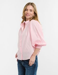 DESCRIPTION Add a touch of femininity to your wardrobe with the Clara Shirt by Italian Star in soft pink. This charming shirt features a delicate stand collar and a button-through front, exuding effortless elegance. The voluminous sleeves with gathered cuffs add a playful touch, while the relaxed fit ensures all-day comfort. Perfect for both work and casual wear, this versatile shirt will quickly become a staple in your collection. For a polished office look, pair the Clara Shirt with tailored b Pink Relaxed Fit Feminine Shirt, Classic Pink Collared Top, Feminine Spring Tops With Collared Neckline, Classic Pink Tops With Collared Neckline, Pink Relaxed Fit Blouse For Daywear, Feminine Blouse With Collared Neckline, Spring Feminine Collared Blouse, Feminine Pink Collared Top, Chic Pink Shirt For Daywear