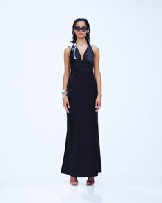 Slip into seduction with this black maxi dress 🖤 Made from luxurious satin charmeuse fabric, this piece is complete with a bias cut and a cowl neck for a look that gives off a chic and mysterious vibe that will have everyone hooked 😌 Sleek Floor-length Bias Cut Satin Dress, Sleek Bias Cut Floor-length Satin Dress, Sleek Bias-cut Floor-length Satin Dress, Sleek Satin Maxi Dress For Night Out, Sleek Satin Finish Maxi Evening Dress, Sleek Long Satin Evening Dress, Sleek Satin Maxi Dress, Sleek Satin Floor-length Maxi Dress, Sleek Fitted Floor-length Satin Dress