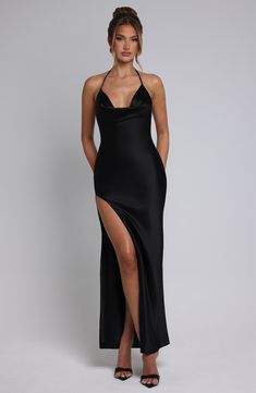 With her cowl neckline and even lower dropped back, Kiandra is the perfect desgin for formal dinners that turn to late night afterparties. Cut from a luxe non-stretch satin which skims over the figure, a low, exposed back and thigh high split add drama. Finish the look with a pair of statement earrings and a glossy lip, and you'll be turning heads the whole night. 



Colour: Black.

Premium non-stretch satin.

Fully lined.

Cowl, halter neckline.

Low cowl back.

Ties to the reverse to create d Homecoming Dresses Corset, White Dress Spring, Midi Dress Wedding Guest, Dresses Flowy, Split Long Dress, Maxi Dress Sale, Sparkle Dress, Maxi Dress Navy, Cowl Neckline