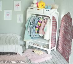 a small child's closet with clothes and toys