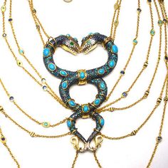 Stunning Diamond Sapphire Turquoise Snake Necklace Boucheron Inspired Red Carpet Worthy, Sits beautifully on the neck and Bust 14k Gold- 2 gms Rosecut Diamond- .75 Silver- 72.94 Turquoise- 12 carats Blue Sapphire- 9.5 carats Please note that it is very difficult to set up proper international shipping rates to each country. Please contact me and I will give you a direct quote for shipping and insurance charges to your country and will adjust accordingly as you will be charged for the ACTUAL ship Luxury Blue Jeweled Necklaces, Luxury Turquoise Pendant Necklace, Luxury Blue Jeweled Jewelry, Exquisite Turquoise Jewelry Gift, Exquisite Turquoise Jewelry As Gift, Exquisite Turquoise Jewelry For Gift, Luxury Turquoise Gemstone Necklace, Luxury Turquoise Pendant Jewelry, Luxury Turquoise Round Necklace