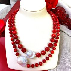 This handmade necklace is made of red corals with baroque pearls with Japan golden plated brass findings. It's beautiful and brilliant and can be matched with a midi dress, tube top, or knitwear from day to night for any occasion. Match it with Farra earrings to complete your look. Also, this is a very nice gift for birthdays, anniversaries or festivals. It will be contained in a nice jewelry box. Elegant Single Strand Red Coral Necklaces, Elegant Single Strand Red Coral Necklace, Elegant Coral Pearl Necklace With Round Beads, Elegant Handmade Red Coral Necklaces, Handmade Elegant Red Coral Necklace, Elegant Red Coral Round Bead Necklaces, Elegant Red Coral Round Bead Necklace, Elegant Red Pearl Necklace Gift, Handmade Elegant Red Coral Pearl Necklace