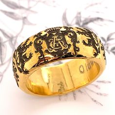 This unique Personalized Family Crest Handmade Sterling Silver Wedding Band is more like a work of art than a piece of jewelry. It can be customized with your initials in victorian style monogram. The ring measures 11mm in width. The profile of the ring is dome with hammered texture. The ring is custom made by order. Please confirm your finger size with the local jeweler before placing the order. This bohemian style Unisex Wedding Ring can make a perfect Wedding Band, Anniversary Ring and Promis Luxury Gold Engraved Ring With Engraving Option, Luxury Engraved Open Ring For Wedding, Luxury Ceremonial Engraved Ring With Polished Finish, Luxury Hallmarked Engraved Ring For Ceremonial Occasions, Luxury Engraved Round Band Ring Hallmarked, Luxury Hallmarked Engraved Round Band Ring, Luxury Engraved Hallmarked Round Band Ring, Heirloom Engraved Open Ring Hallmarked, Luxury Engraved Hallmarked Ring