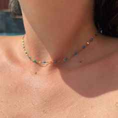 These precious chokers are the perfect layering summertime pop of color! Add them to your existing stack, or they're totally rad by themselves Wear them as a proper choker, or wrap it around your wrist to rock as a bracelet! Every choker is 14" with an attached 2" extender for adjustability up to 16" Don't like a choker? We can make yours 18" for an additional $5 by checking the box below Blue Tiny Beads Choker For Summer, Trendy Blue Choker With Tiny Beads, Adjustable Tiny Beads Choker, Trendy Resizable Jewelry For Festivals, Dainty Summer Choker, Summer Gold Choker With Tiny Beads, Gold Tiny Beads Choker For Summer, Adjustable Summer Choker Necklaces, Summer Adjustable Choker Necklace