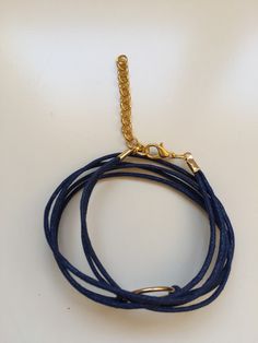 "BUY TWO GET A THIRD FOR FREE!! (please, don't add your free product to your shopping cart or you will be charged for it. Pick 1 product and leave the full name of it in the \"Note to enjoywelrydesign\" Box during checkout.)This is a waxed cotton Karma bracelet with a metal ring charm. What goes around, comes around. Wear your bracelet as a reminder, to keep the circle positive, peaceful and loving. The bracelet is adjustable and fits wrists from 51/2'' to 81/2\" (14cm to 22cm). Finishing, alloy Resizable Gold Wrap Bracelet As Gift, Adjustable Gold Minimalist Wrap Bracelet, Trendy Resizable Jewelry With Nylon Cord, Casual Gold Waxed Cord Jewelry, Adjustable Gold Spiritual Wrap Bracelet, Adjustable Bangle Wrap Bracelet Gift, Gold Bracelets With Adjustable Waxed Cord, Adjustable Wrap Bracelet For Gift, Gold Friendship Bracelets With Adjustable Band