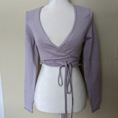 Nwt Zara Cropped Wrap Sweater In Lilac Gorgeous And Super Trendy Lilac Cropped Sweater. Long Ties That Can Be Tied In The Front Or Back. Long Sleeves. Great Thick Fabric With Some Stretch. Rolled Hem. Looks Great Over A Dress Or A Tank. Or Wear It As Is Paired With High Waisted Jeans. Bloggers Favorite! B81 Cropped Wrap Sweater, Zara Casual Long Sleeve Cropped Sweater, Trendy Knit Wrap Sweater, Fitted Knit Wrap Sweater, Ballet Wrap Sweater, Purple Cropped Cardigan, Loose Pullover Sweater, Pink Knit Sweater, Heavy Sweaters