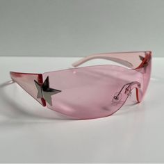 Y2k 2000s Vintage Style Pink Frameless Star Sunglasses Pink Frame With A Pink Frameless Lens These Glasses Are Unisex! Uva And Uvb Protection Brand New #Sunglasses #Shades #Sunnies #Fashion Pink Star Glasses, Y2k Sunnies, Leo Midheaven, Y2k Fashion Sunglasses, Y2k Rimless Sunglasses, Sunglasses 2000s, Pink Y2k Sunglasses, 2000s Accessories, Mcbling Sunglasses