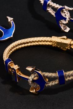 Unbox the bold elegance of our Ocean Twined Anchor Bangle. Handcrafted with precision, this piece is not just a bracelet; it's a symbol of nautical allure and timeless sophistication. Ocean Colors, Elegant Man, Blue Jewelry, Classic Blue, Jewelry Lover