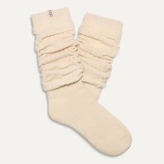 We take lounging VERY seriously, so trust us when we say the Clarice Tall Slouchy Sock is the "it girl" when it comes to comfy socks. Soft, dreamy, and super cozy, you can wear these pulled up to the knee or slouched down. Tall slouchy chenille sock 99% Polyester / 1% Elastane 18" height Soft twill tape with The UGG® Logo on top cuff Fits shoe size: 5-10 Imported Style #1161650 Cozy Mid-calf Socks For Stocking Stuffers, Cozy Comfortable Knee-high Socks For Stocking Stuffers, Cozy Soft Socks One Size, Cozy Soft One-size Socks, Cozy Snug Knee-high Socks, Cozy Cotton Socks With Comfortable Fit, Cozy Cotton Knee-high Socks For Fall, Comfortable Cozy Cotton Socks, Comfortable Cotton Knee-high Socks For Fall