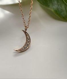 Dainty Diamond Moon Necklace  Pendant in 14k rose gold.This necklace is perfect by itself or or layered. You can wear it day or night. This necklace is versatile and perfect as a gift. Effortlessly trendy and beautiful!Metal.......14k Rose gold Pure gold /  Finish.... polish Necklace.....Handmade in USA Diamond weight......0.10CTG - VS1 quality *14k rose  gold chain included *Chain sizes Available.. 16”, 18” , 20 inches long Elegant Sterling Silver Crescent Charm Necklace, Elegant Everyday Crescent Charm Necklace, Elegant Moon Shape Clavicle Chain Necklace, Elegant Rose Gold Charm Necklaces For Everyday, Elegant Rose Gold Charm Necklace As Gift For Her, Elegant Rose Gold Charm Necklace For Her, Elegant Moon-shaped Necklace With Delicate Chain, Elegant Crescent Charm Necklace With Delicate Chain, Minimalist 14k Rose Gold Necklace