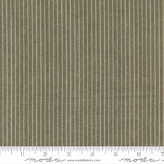 an image of a brown and white striped fabric with lines on it, as well as the