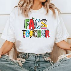 FACS Teacher Shirt, Family and Consumer Sciences Shirt, Home Economics Shirt, FCS Teacher T-shirt, Gift for Teacher, Teacher Sweatshirt Don't hesitate to contact us if you have any questions about colors, sizes, and personalization's.  *Our processing time is 1-2 business days and we're located in Texas, US. *We use high quality DTF Printing to print the designs on an iron-on vinyl. To Order: Select a size, color, and add personalization (if applicable) before adding to your cart.  How to Take C Fun Slogan Tops For School, Relaxed Fit School Top With Funny Print, Fun Slogan Short Sleeve Shirt, Fun Short Sleeve Slogan Shirt, Trendy School Tops With Funny Text, Funny Multicolor Cotton Shirt, Funny Letter Print Tops For School, Fun Short Sleeve Shirt With Letter Print, Fun Short Sleeve Tops With Letter Print