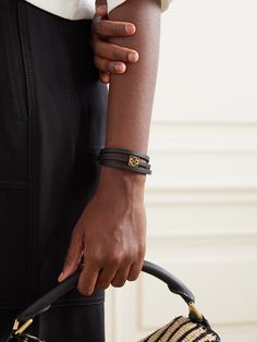 This 'Twist' bracelet combines Loewe's renowned leather craftsmanship with the spirit of Paula's Ibiza. Designed in a slim shape that's meant to wrap multiple times around the wrist, it's been made in Spain and strung with the signature gold-tone 'Anagram' embellishment.