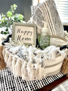 a basket filled with personal care items on top of a table next to a potted plant